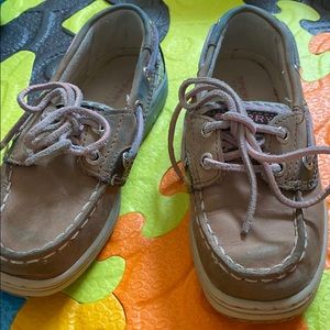 Brown and pink Sperry shoes